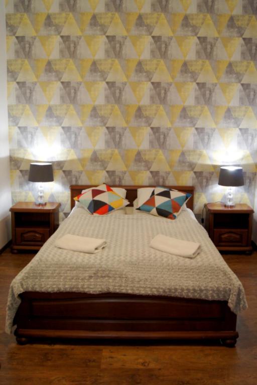 Posteľ alebo postele v izbe v ubytovaní Cozy Old Town Apartments