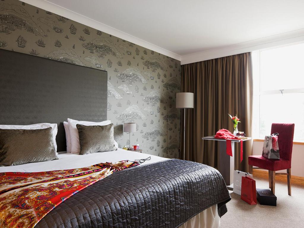 Postel nebo postele na pokoji v ubytování Brandon House Hotel