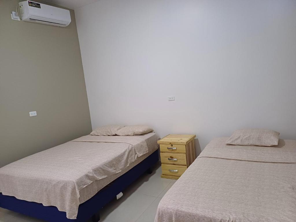 Postel nebo postele na pokoji v ubytování Casa Puka