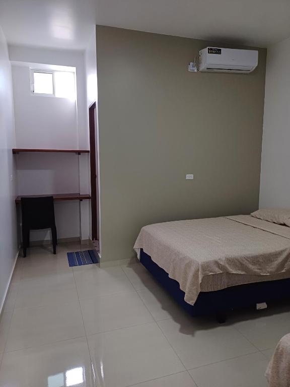 Postel nebo postele na pokoji v ubytování Casa Puka