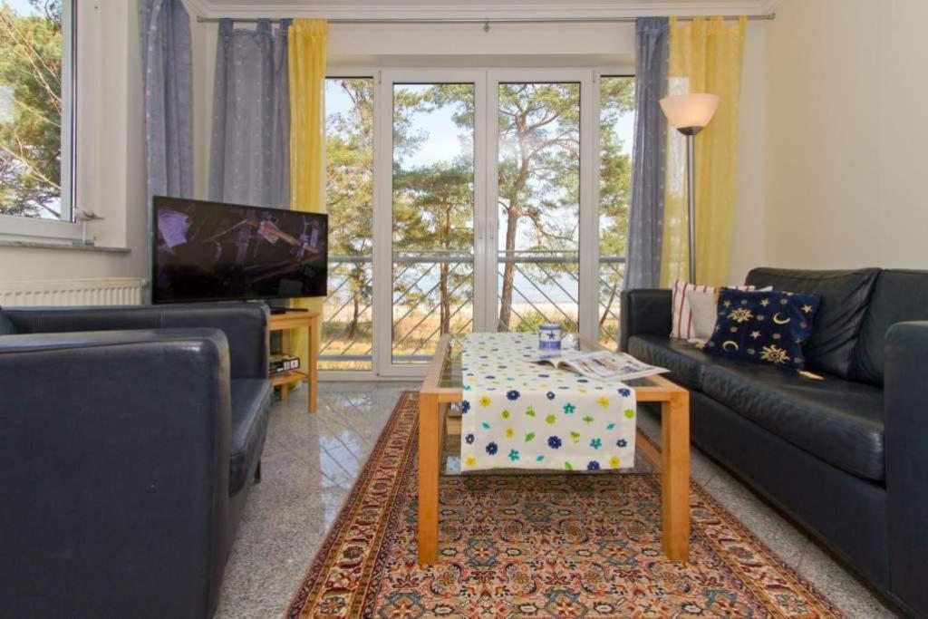 TV a/nebo společenská místnost v ubytování Villa Strandperle, App 08