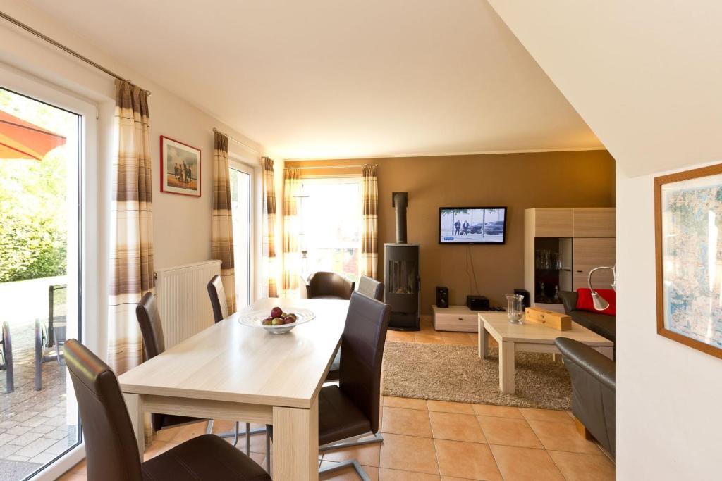 TV a/nebo společenská místnost v ubytování Ferienhaus Bella Vista
