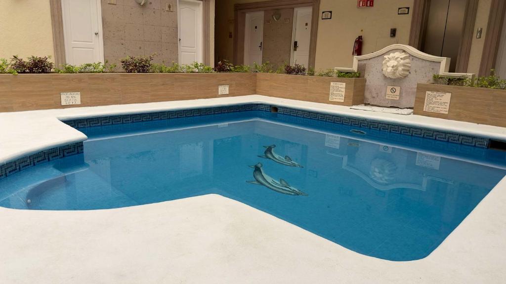 La alberca dentro o cerca de Best Western PLUS Monterrey Colón