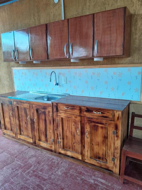 Kuchyň nebo kuchyňský kout v ubytování Cabañas Compartidas en Casa Quinta en Itá