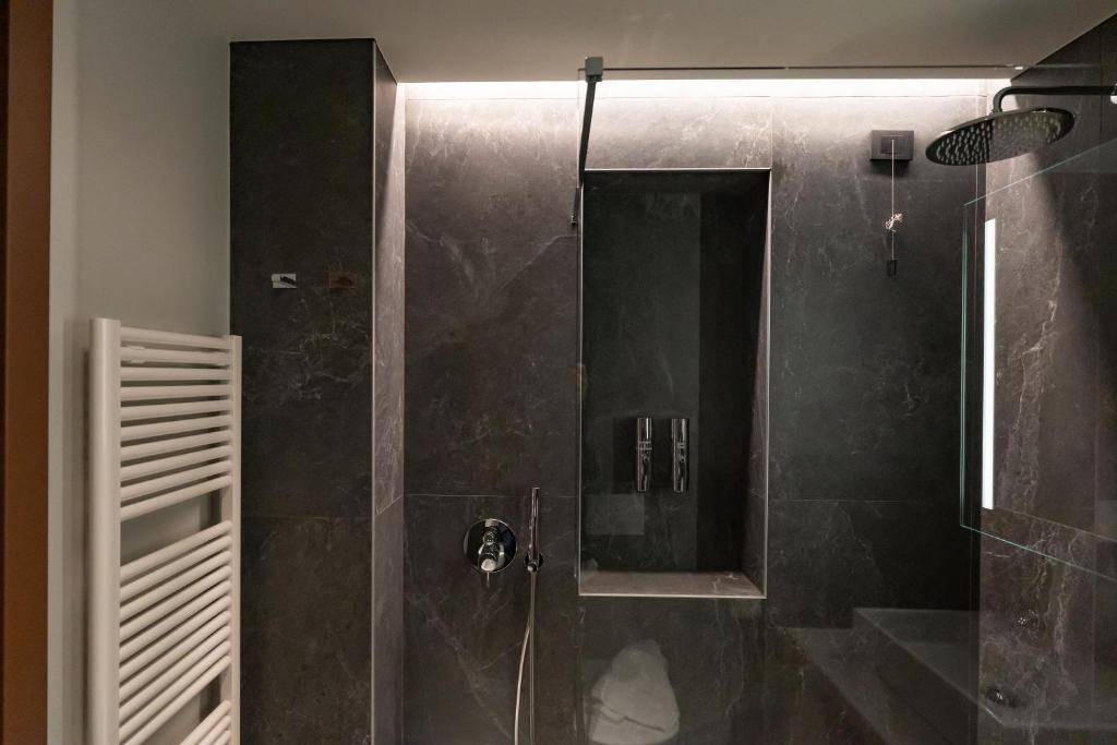 Koupelna v ubytování La Molgora Hotel