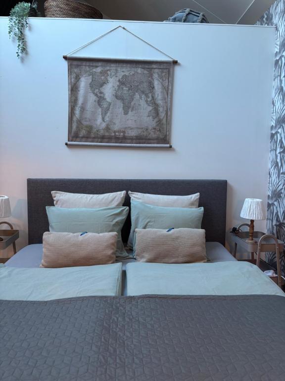 Postel nebo postele na pokoji v ubytování Guesthouse de Loft