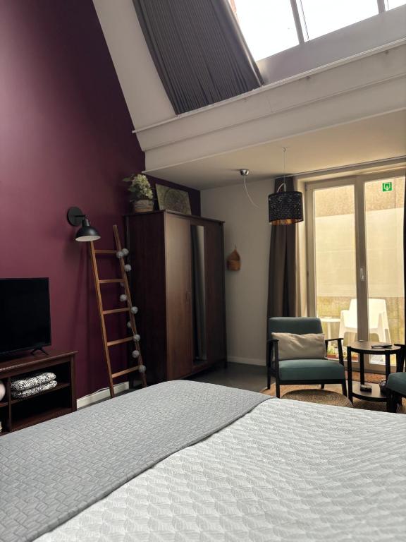 Postel nebo postele na pokoji v ubytování Guesthouse de Loft