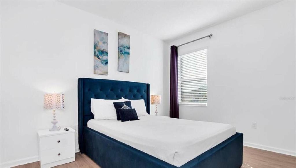 Postel nebo postele na pokoji v ubytování Amazing Vacation Home at Bella Vida BV4509