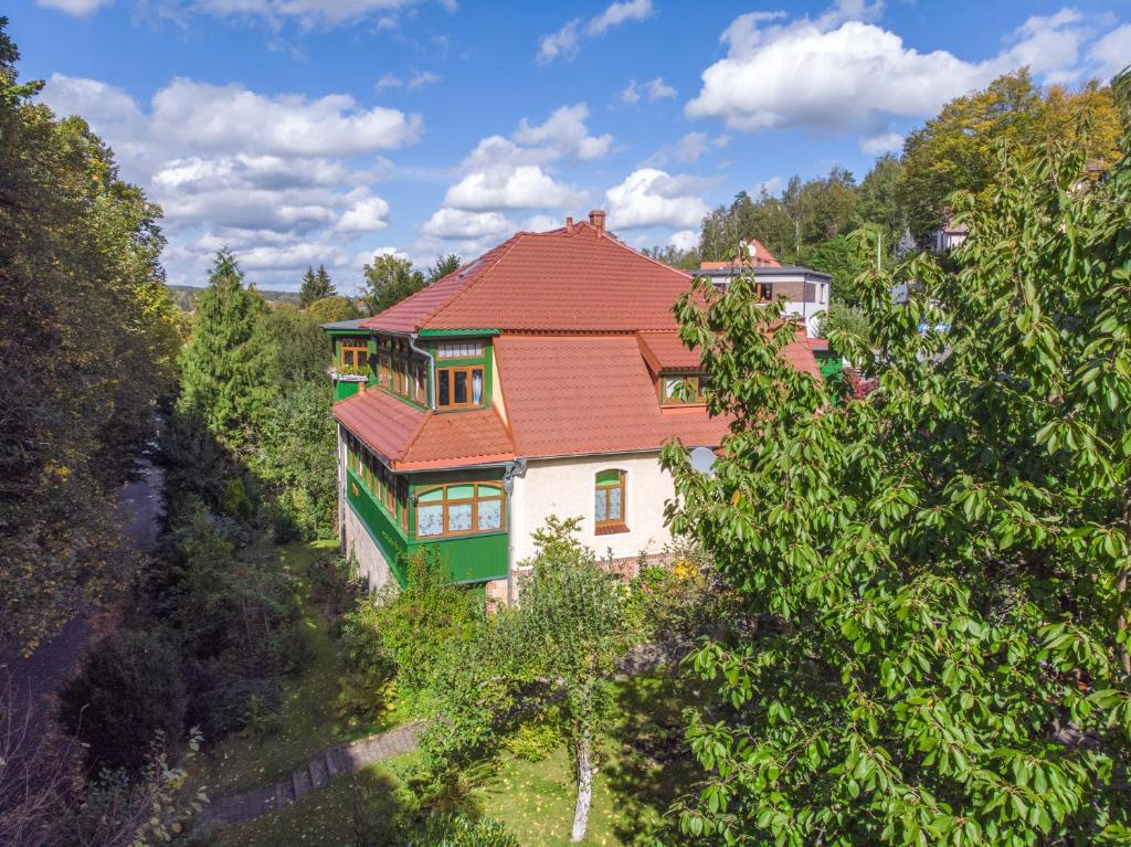 an overhead view of a house with a red roof at Pokoje Gościnne u Markusa in Polanica-Zdrój