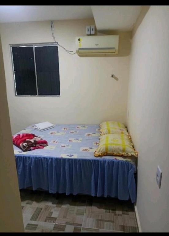 Postel nebo postele na pokoji v ubytování Dani Hostel e Suítes