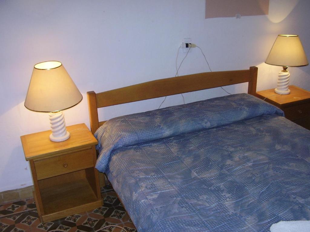Postel nebo postele na pokoji v ubytování Edificio Sagasti