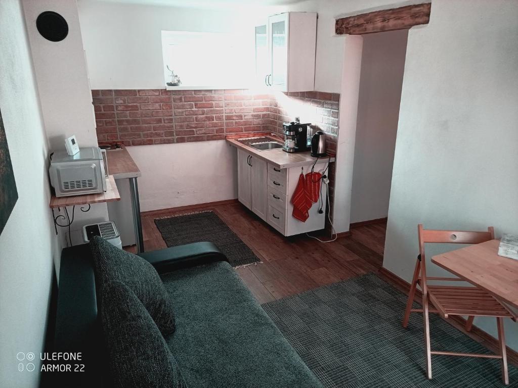 Kuchyň nebo kuchyňský kout v ubytování Apartment 1
