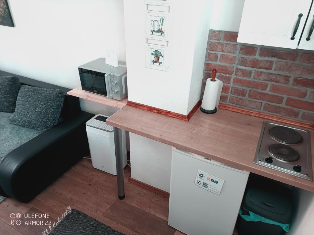 Kuchyň nebo kuchyňský kout v ubytování Apartment 1