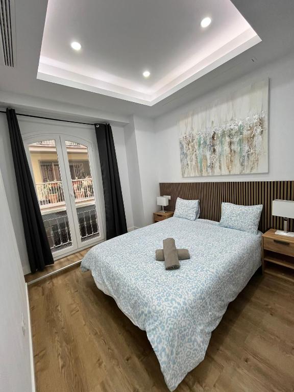 Posteľ alebo postele v izbe v ubytovaní Exclusive Luxury Stay at Plaza Uncibay, Málaga Center