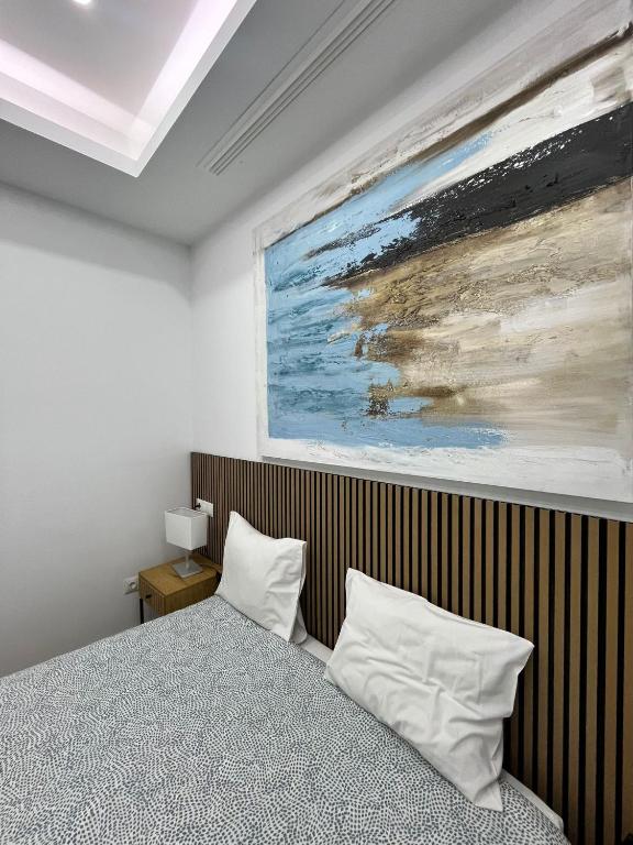 Posteľ alebo postele v izbe v ubytovaní Exclusive Luxury Stay at Plaza Uncibay, Málaga Center
