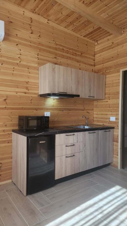 Kuchyň nebo kuchyňský kout v ubytování UniKlajd Villa-s