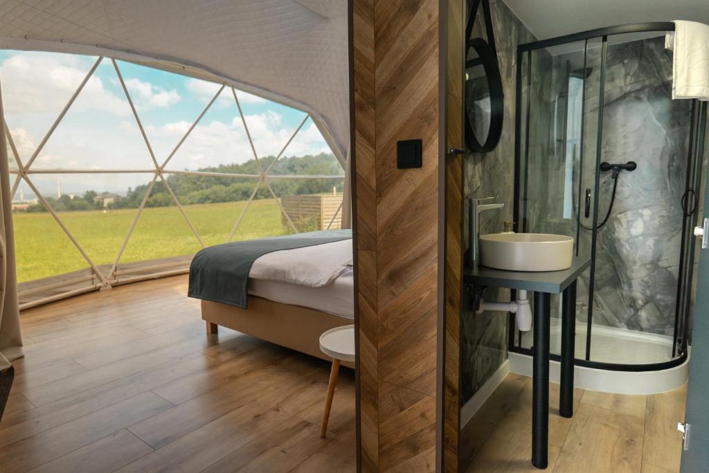 Postel nebo postele na pokoji v ubytování Glamping Resort