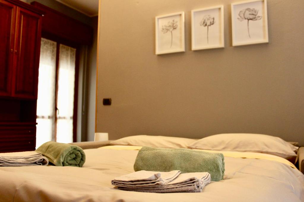 Postel nebo postele na pokoji v ubytování Pietro Apartment Fiera