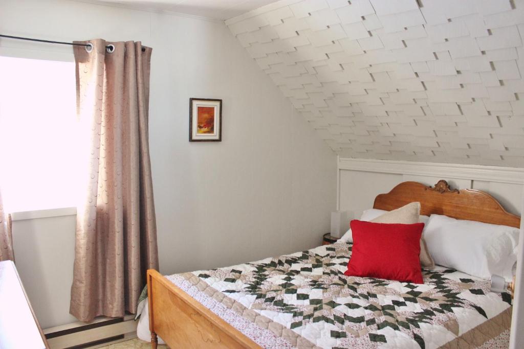 Giường trong phòng chung tại Maison Du Vieux Chemin