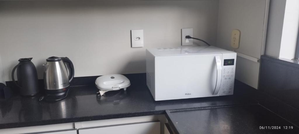 Kuchyň nebo kuchyňský kout v ubytování Casa 4 quartos com piscina