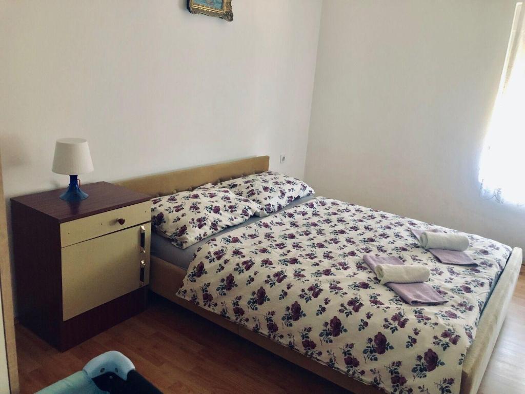 Posteľ alebo postele v izbe v ubytovaní Apartments Kate