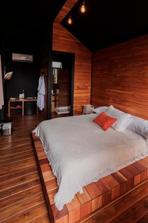 Postel nebo postele na pokoji v ubytování Hotel Coyote