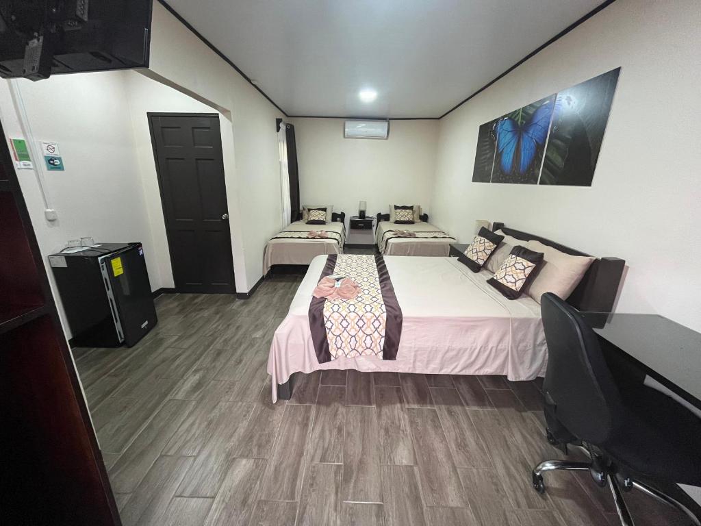 Postel nebo postele na pokoji v ubytování HOTEL DEL RiO