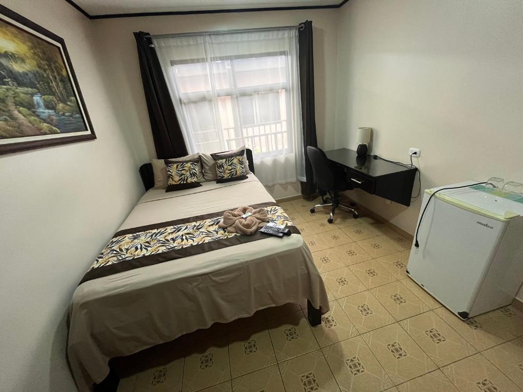Postel nebo postele na pokoji v ubytování HOTEL DEL RiO