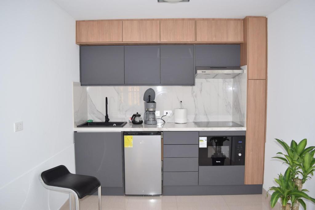 Kuchyň nebo kuchyňský kout v ubytování NAPOLES - Luxury Home