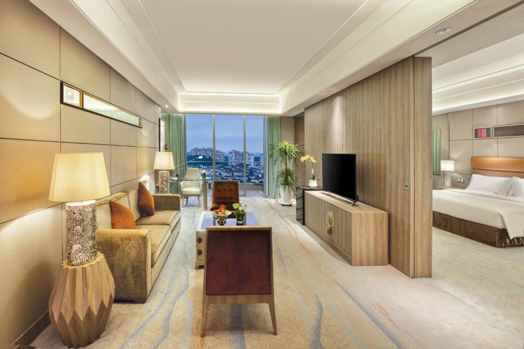 TV a/nebo společenská místnost v ubytování Dongguan Royal Garden Hotel