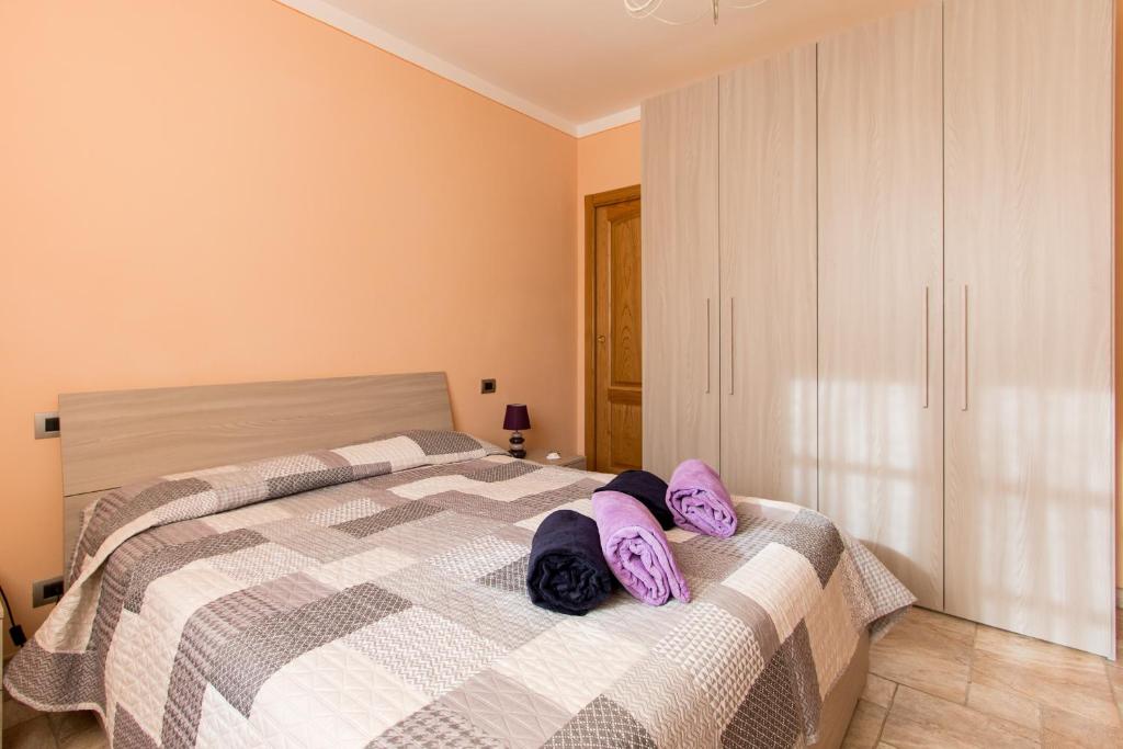 Posteľ alebo postele v izbe v ubytovaní Il Poggiolo