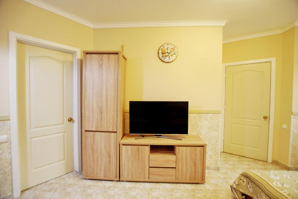 TV a/nebo společenská místnost v ubytování Aurora Ház