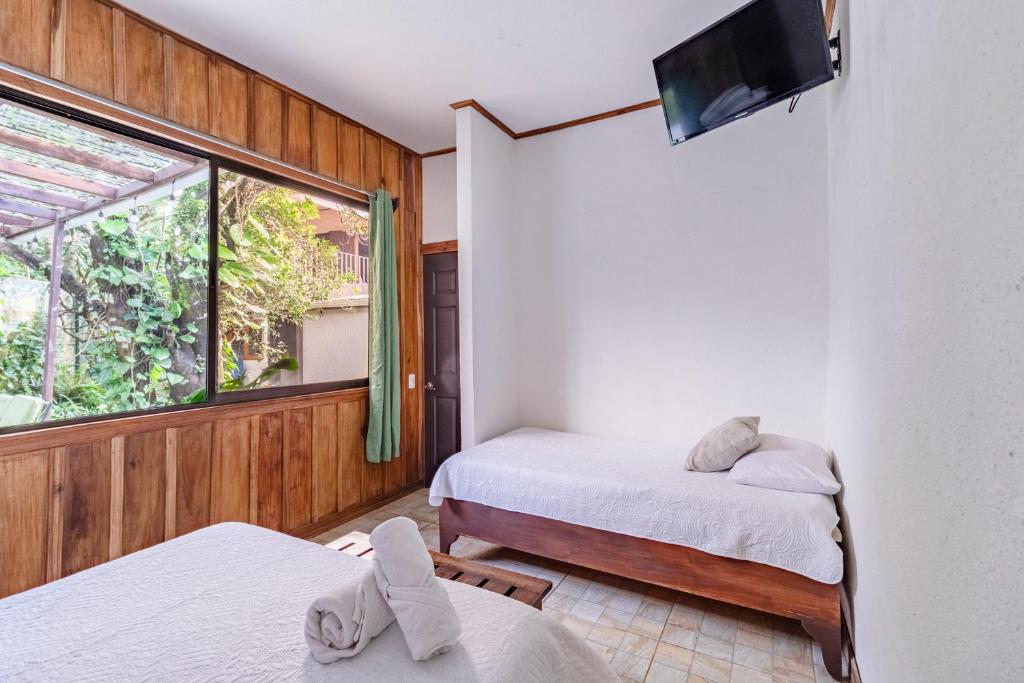 Postel nebo postele na pokoji v ubytování Montefresco Boutique Hostel