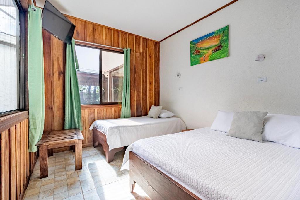 Postel nebo postele na pokoji v ubytování Montefresco Boutique Hostel