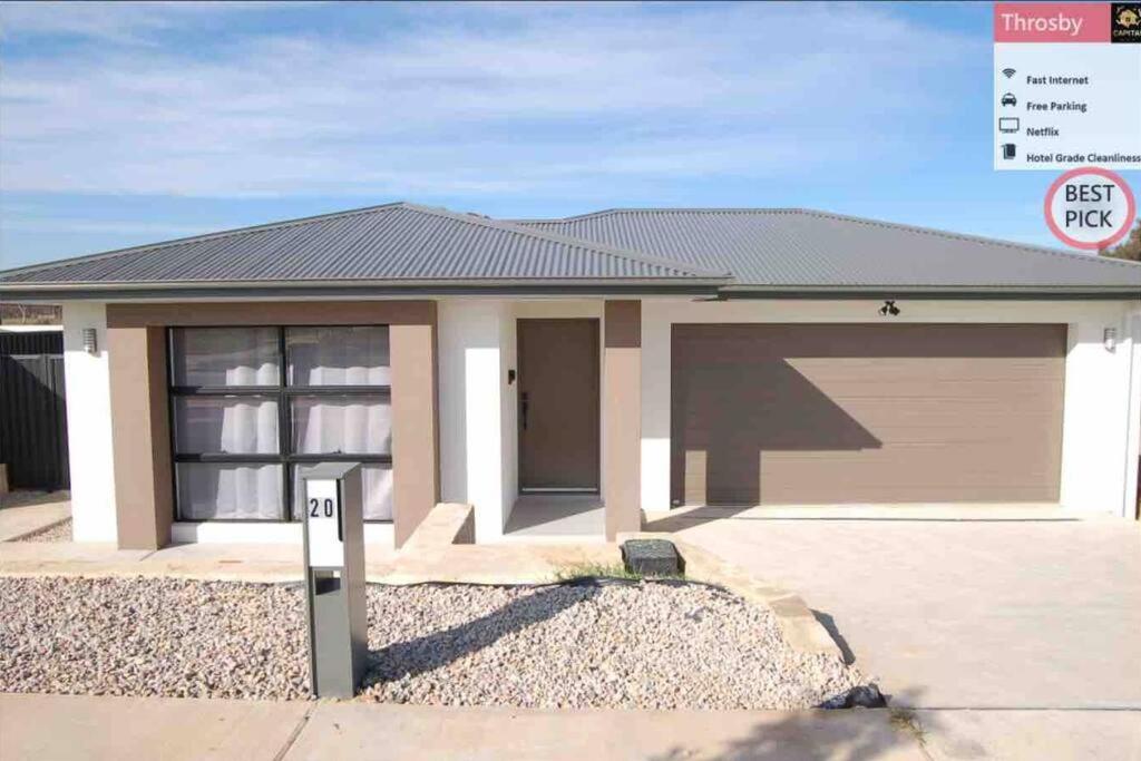 a rendering of a house with a garage at Brand New Delight Home at Throsby with 4 Bedrooms in Harrison