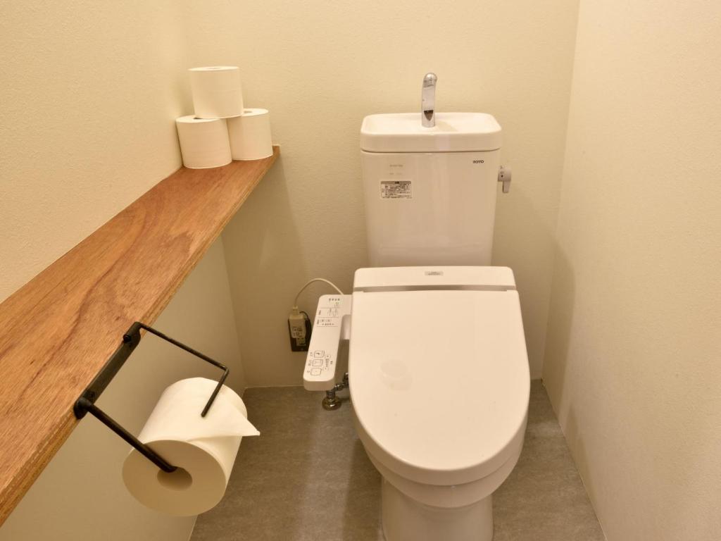 Koupelna v ubytování Hostel Mitsuwaya Osaka
