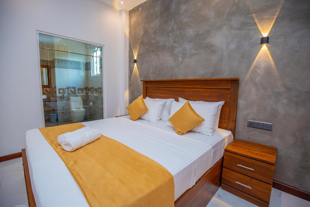 Postel nebo postele na pokoji v ubytování FlyOn Resort