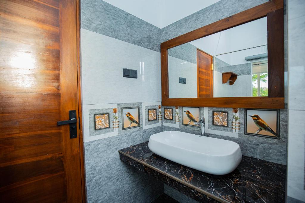 Postel nebo postele na pokoji v ubytování FlyOn Resort