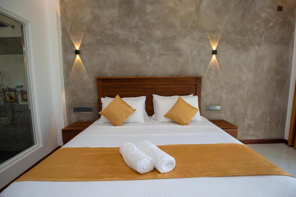 Postel nebo postele na pokoji v ubytování FlyOn Resort