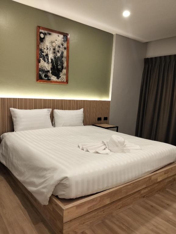 Postel nebo postele na pokoji v ubytování The Deva Boutique