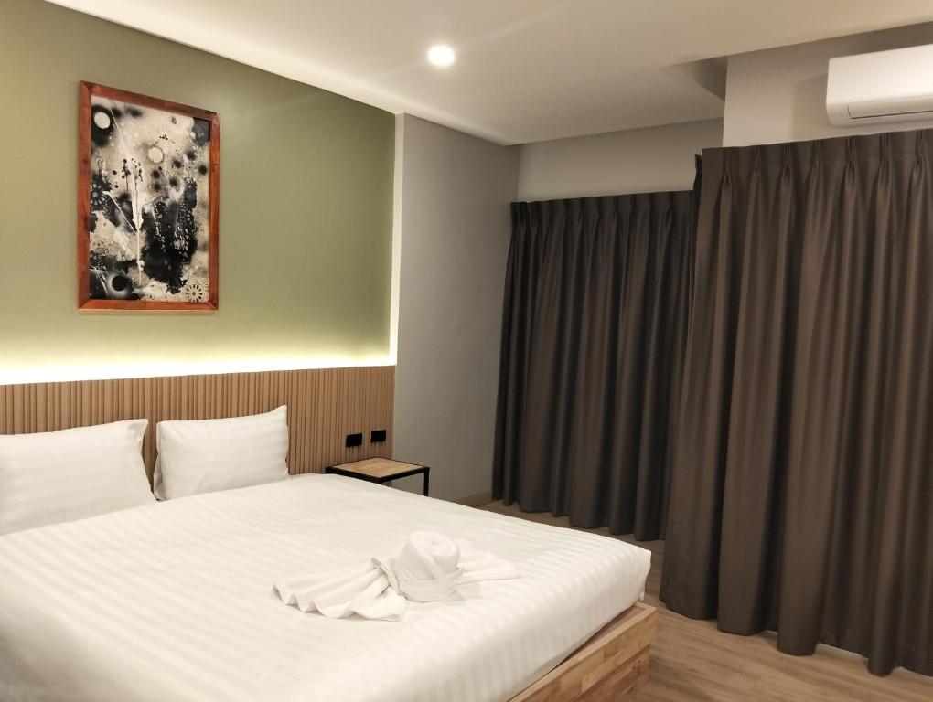 Postel nebo postele na pokoji v ubytování The Deva Boutique