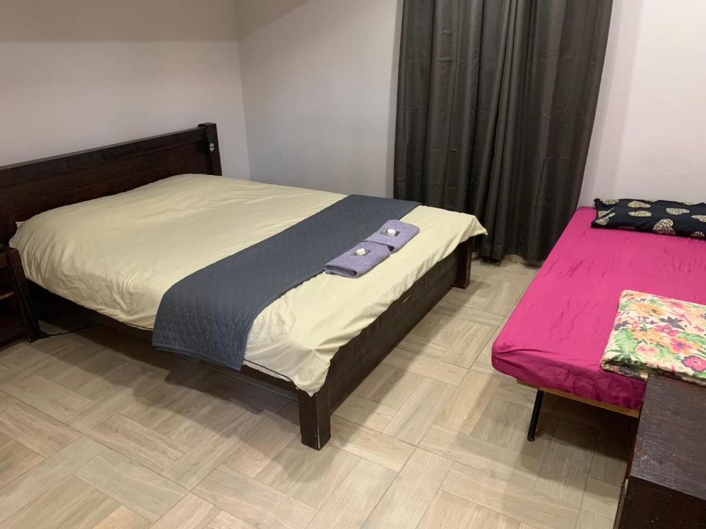 Postel nebo postele na pokoji v ubytování Mi Amor