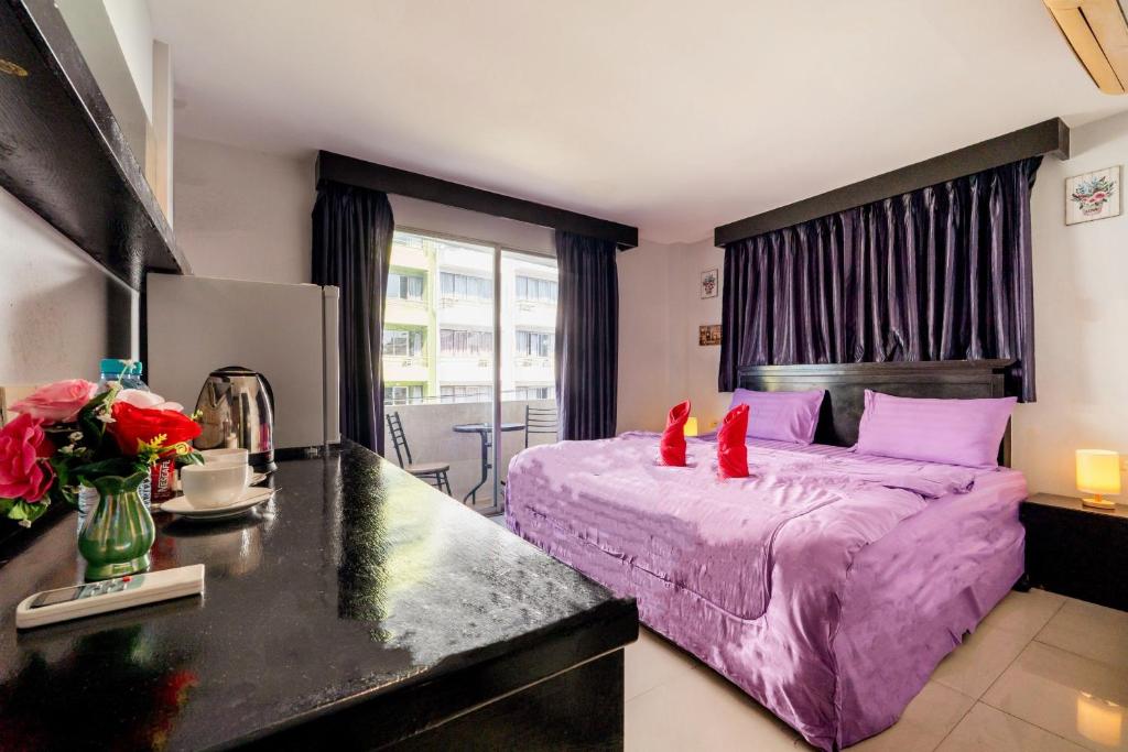 Abunawas Merry Inn at Walking Street - Resim 2