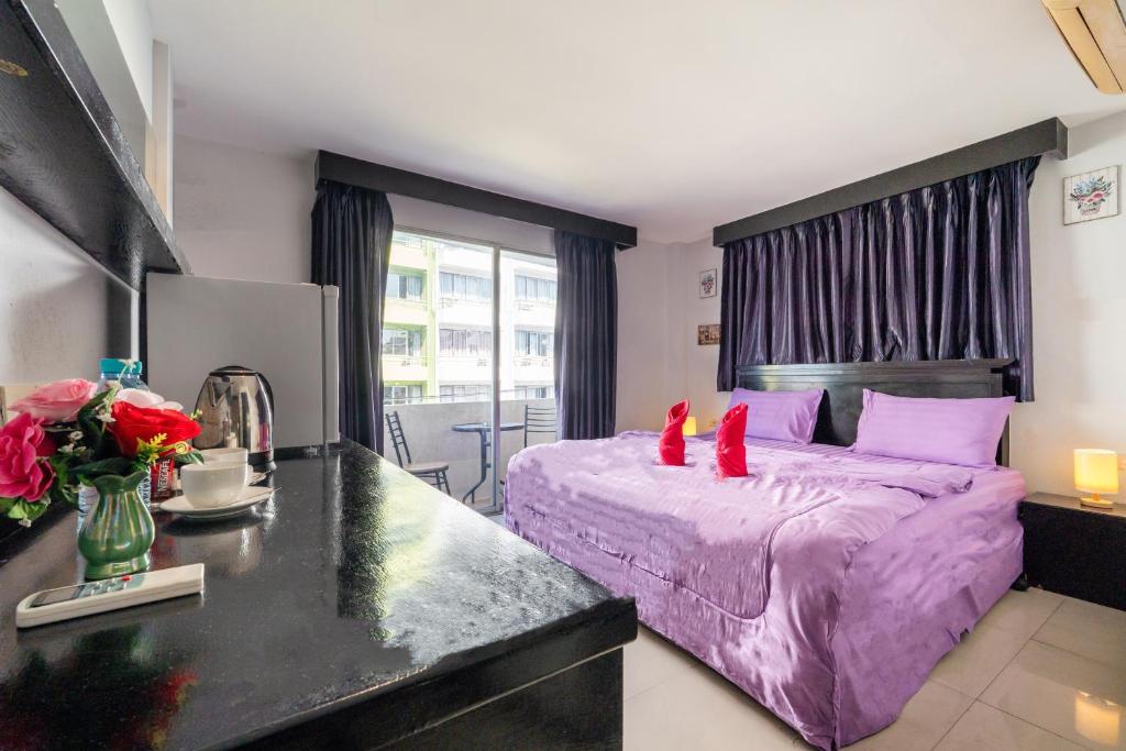 Abunawas Merry Inn at Walking Street - Resim 7