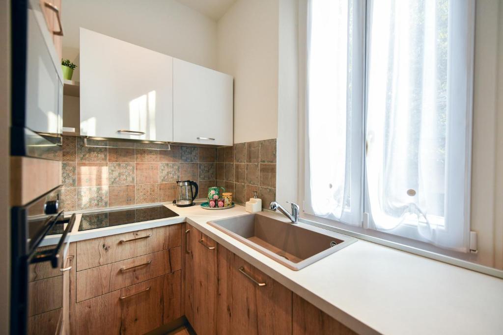 Kuchyň nebo kuchyňský kout v ubytování Villa Sofia