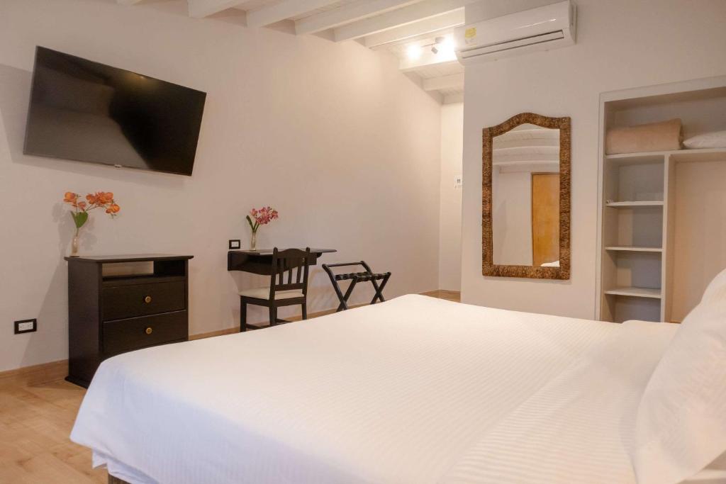 Postel nebo postele na pokoji v ubytování Hotel Faranda Bolivar Cucuta, a member of Radisson Individuals