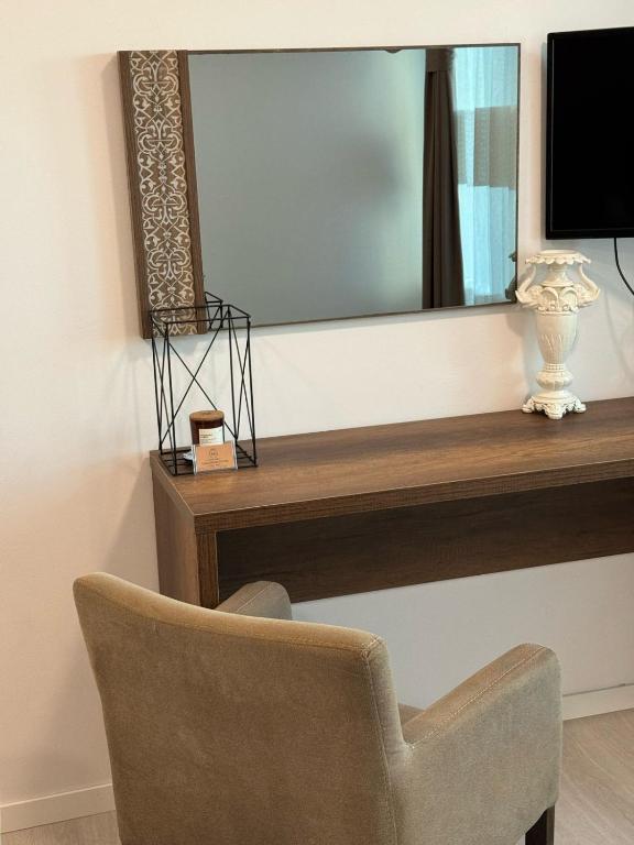 TV a/nebo společenská místnost v ubytování Uniluxury Hotel Prishtina