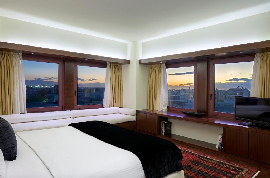 Posteľ alebo postele v izbe v ubytovaní Lazart Hotel, Trademark Collection by Wyndham