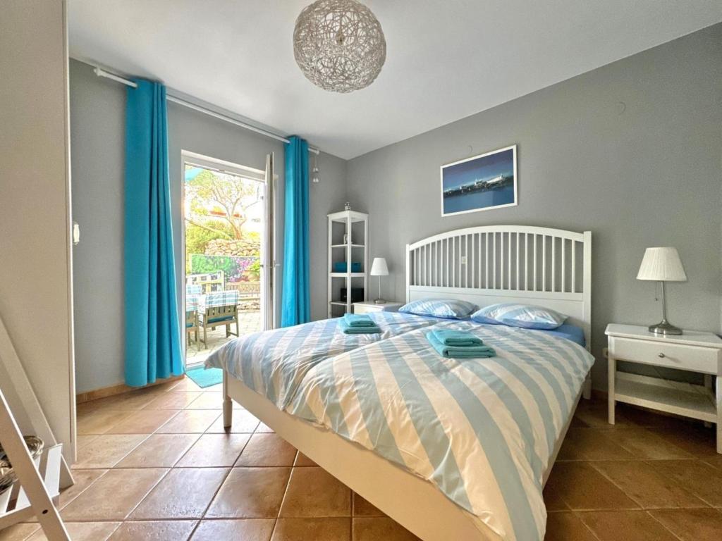 Posteľ alebo postele v izbe v ubytovaní Apartment Didi with private garden, close to the Krk center