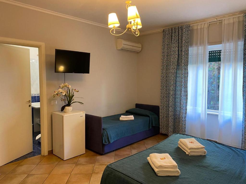 A bed or beds in a room at Domus Prati